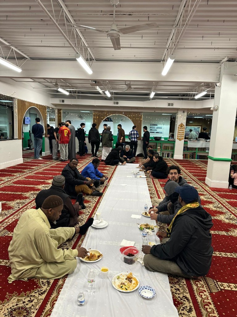 Community members sharing a meal together